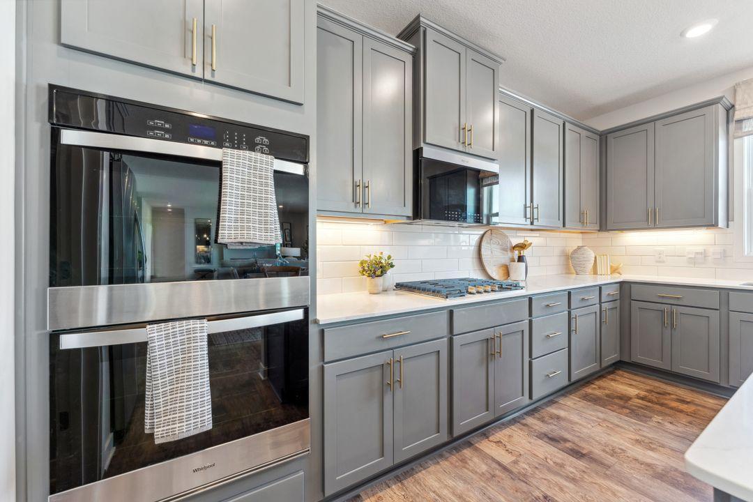 Wide Open floorplan. Jameson floor plan. Photo of previously built home; finishes, selections, colors, and floorplan to vary.
