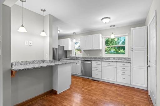 Versatile bonus nook, perfect for a coffee bar, home office, homework station, or casual dining area.