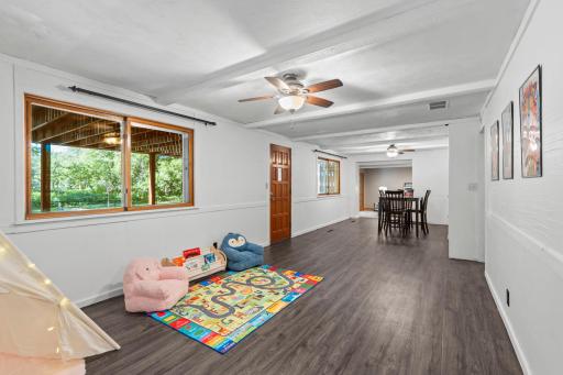 Lower-level amusement room with walkout to patio under deck. Great for entertaining!
