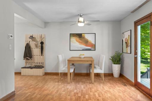 Open dinning space area with a convenient storage/drop zone just off garage-plenty of room for everyday organization and flexible use (Virtually staged)