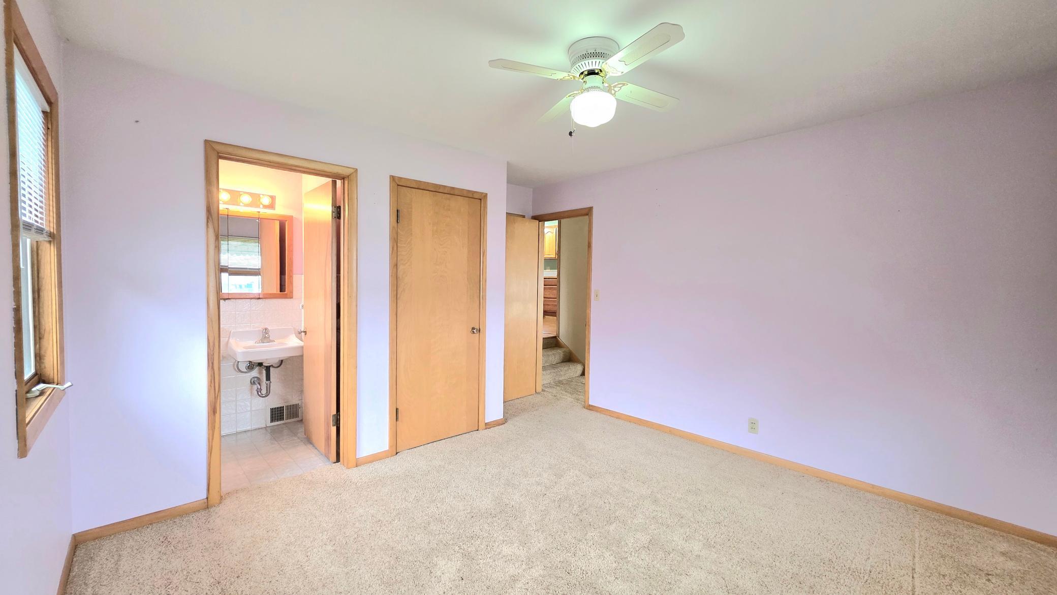 primary bed with private bath and large closet