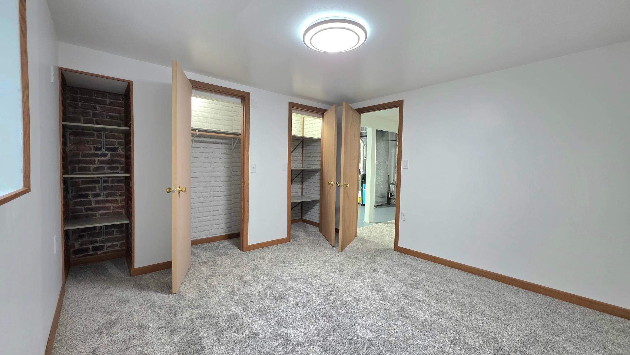 #3 bedroom lighted closets and built in shelving
