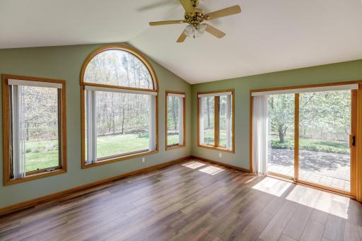 Sunroom features large windows that allows natural light to steam through!