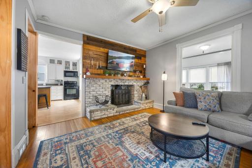 Decorative elements like the wood accents above fireplace give this home character and warmth