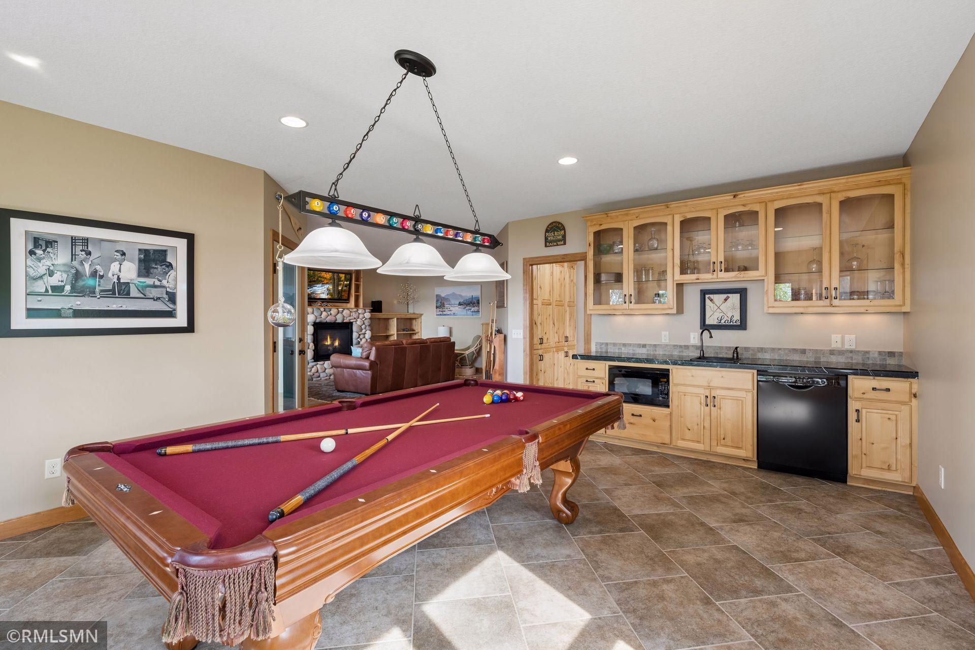 Lower level billiard room with wet bar