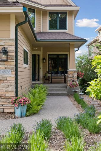 Walkway leading to the front door/covered front porch