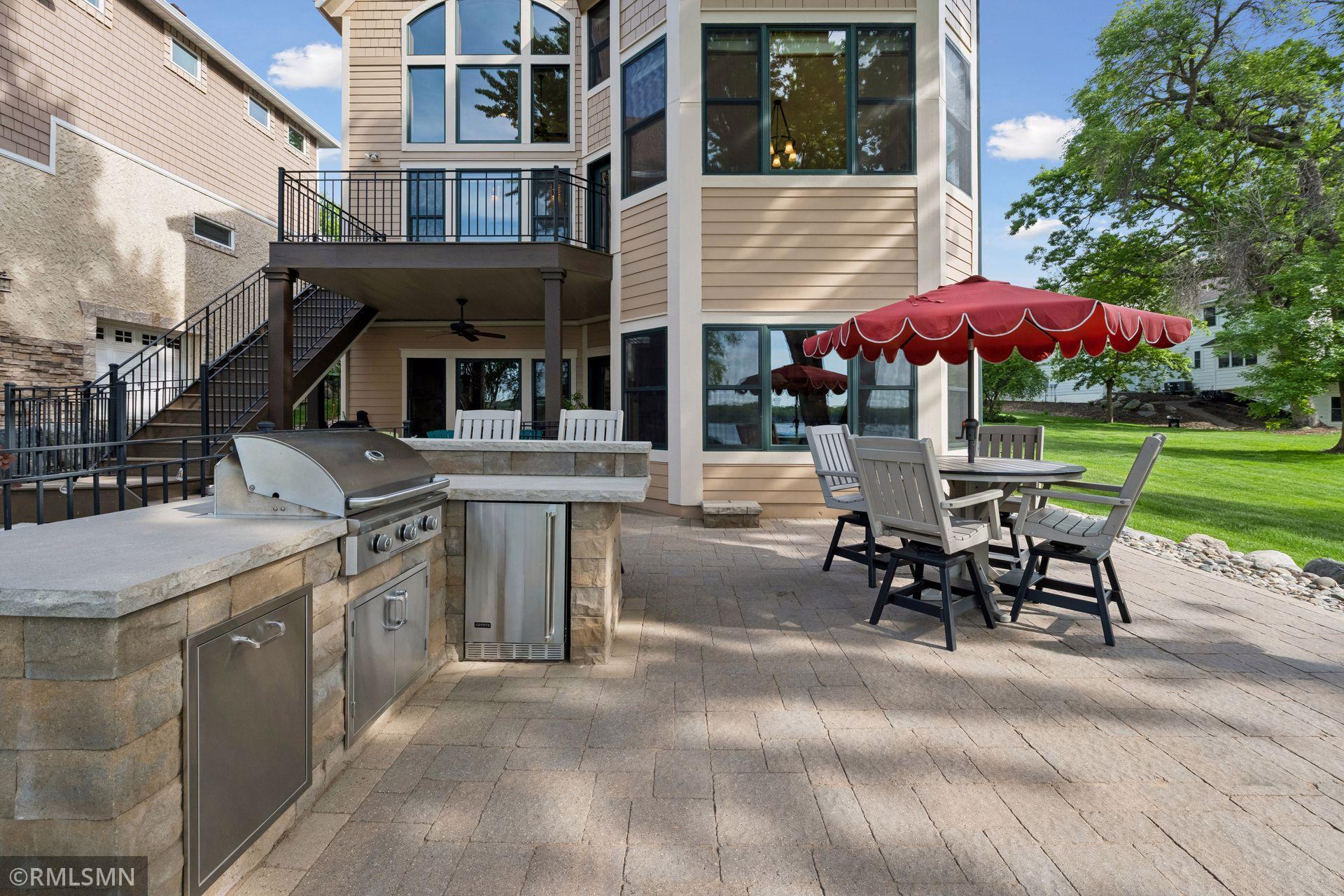 Uncovered patio with outdoor kitchen
