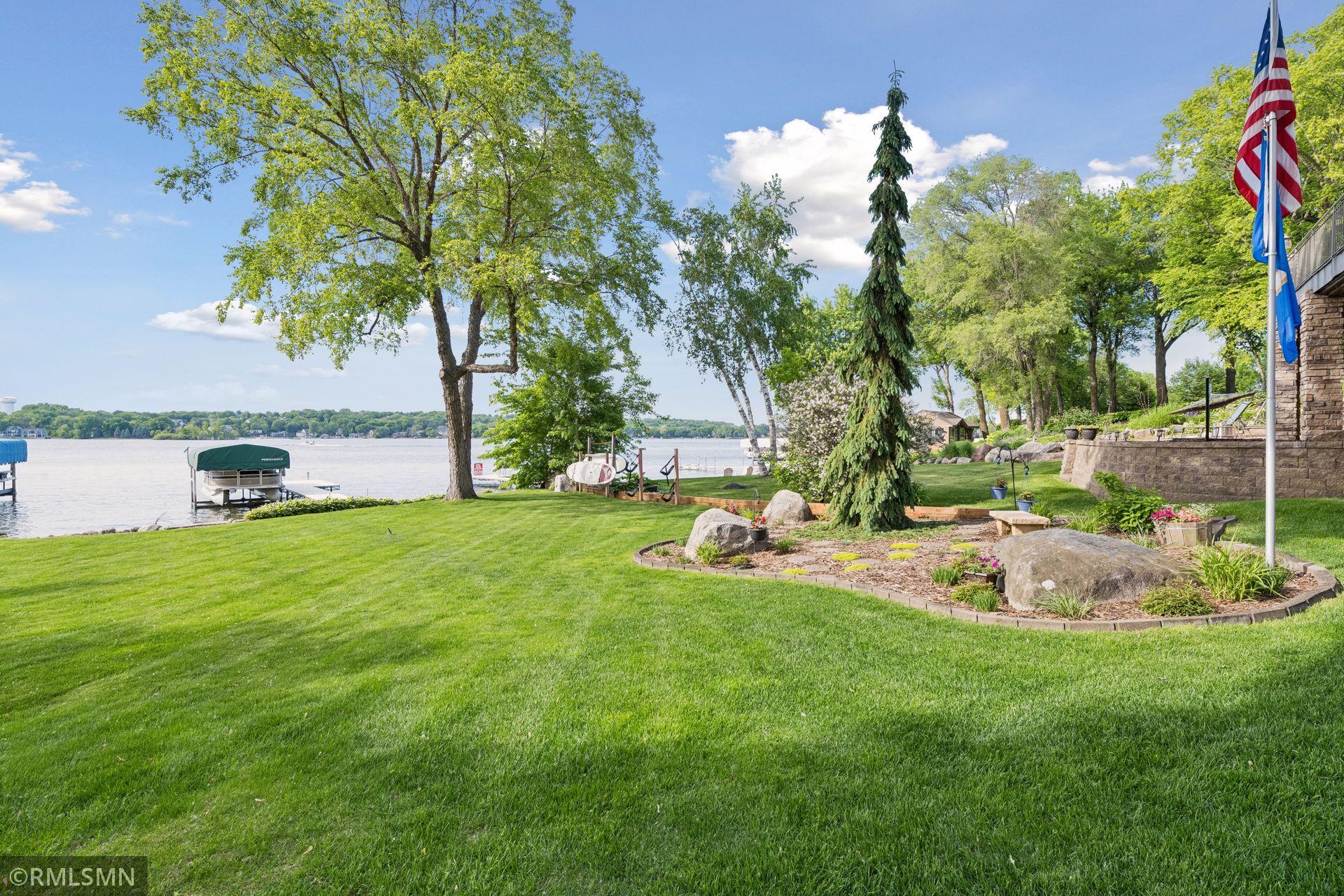 View of a portion of the backyard/lakeside garden