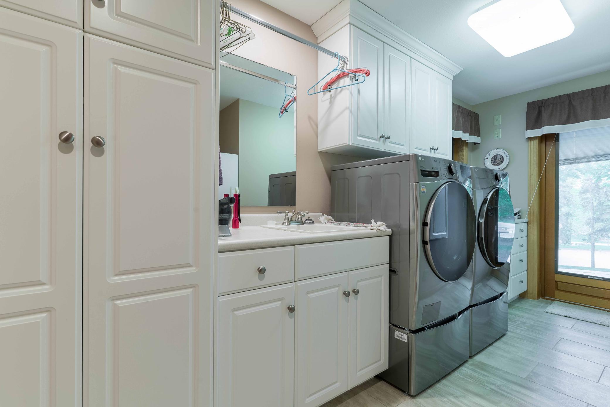 Main Level Laundry with Sitting Patio right out the door