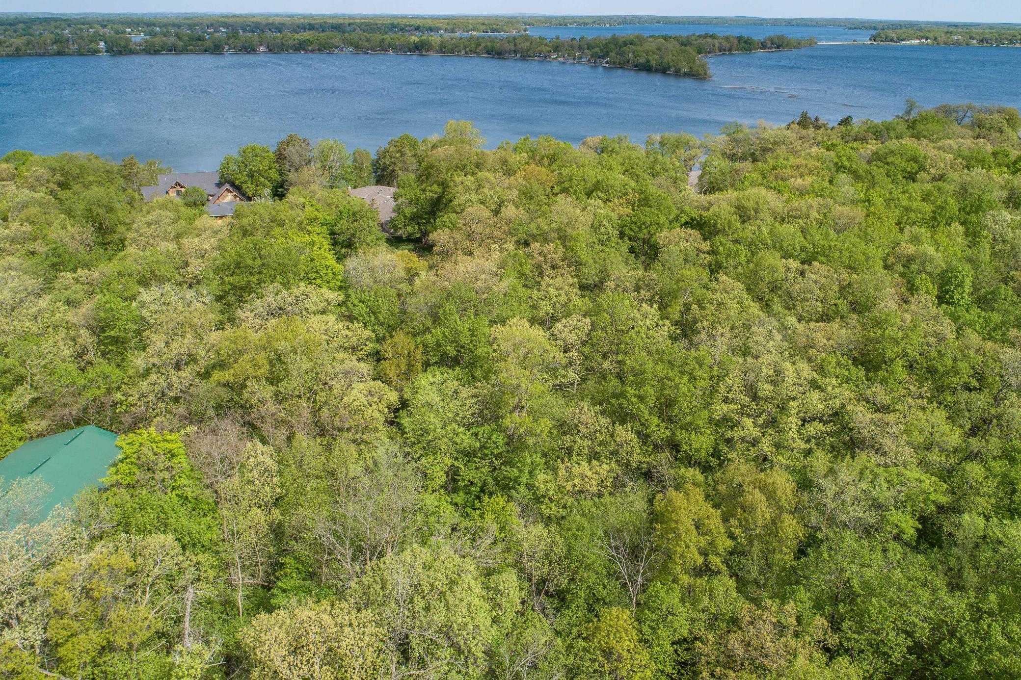 4 Acres of Woods between Home and Road!