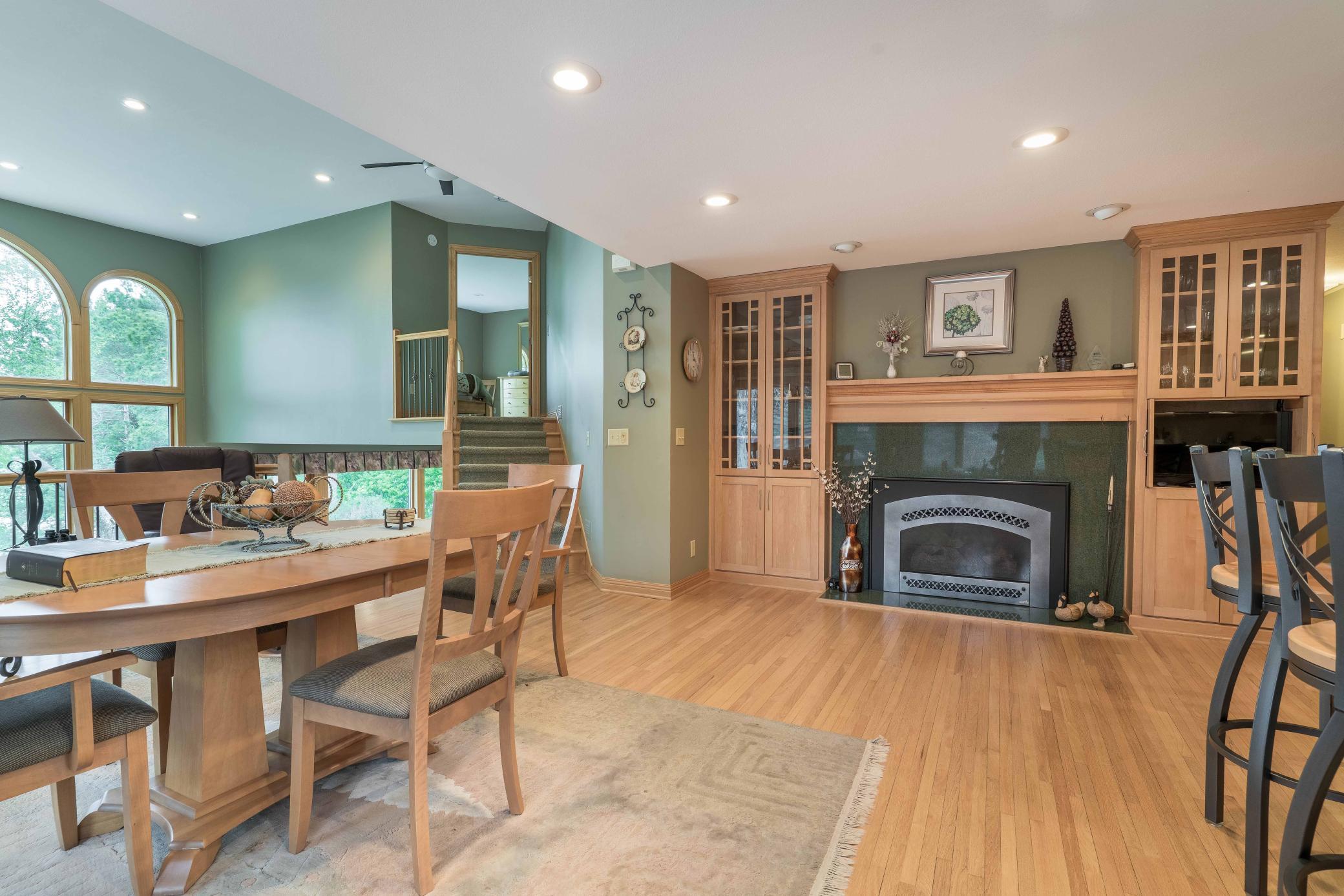 Informal Dining with Lake Views and Fireplace