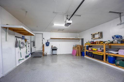 Plenty of storage space with extra shelving in the Garage!