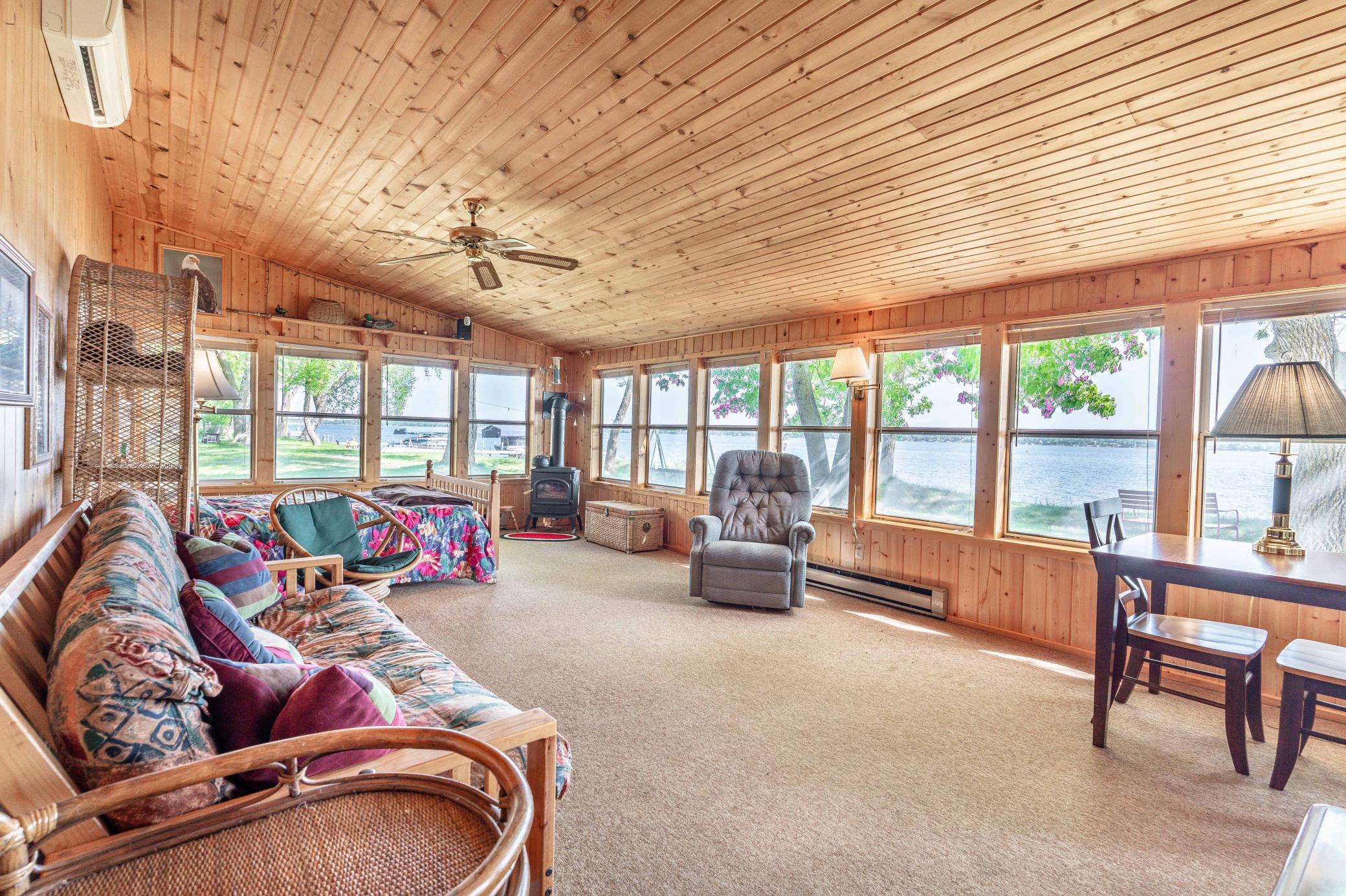 Sun room set up as spare bedroom