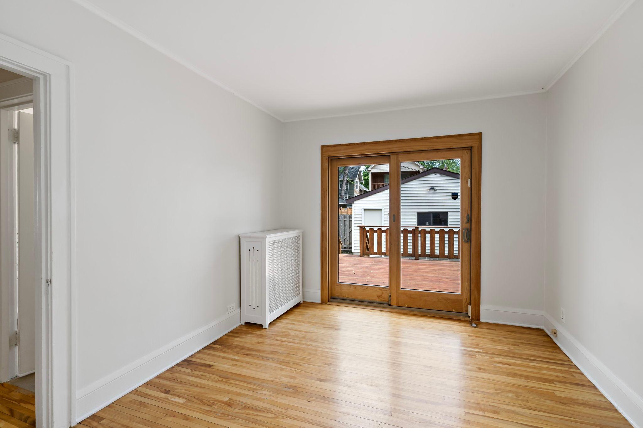 Main floor bedroom 2 also makes a great office. Sliding doors out to deck