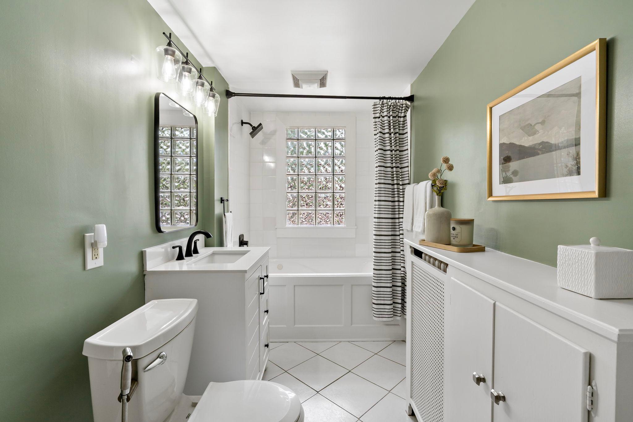 Updated full bath on upper level.