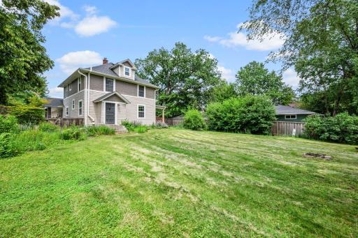 Side of home, side door leads to living room.
