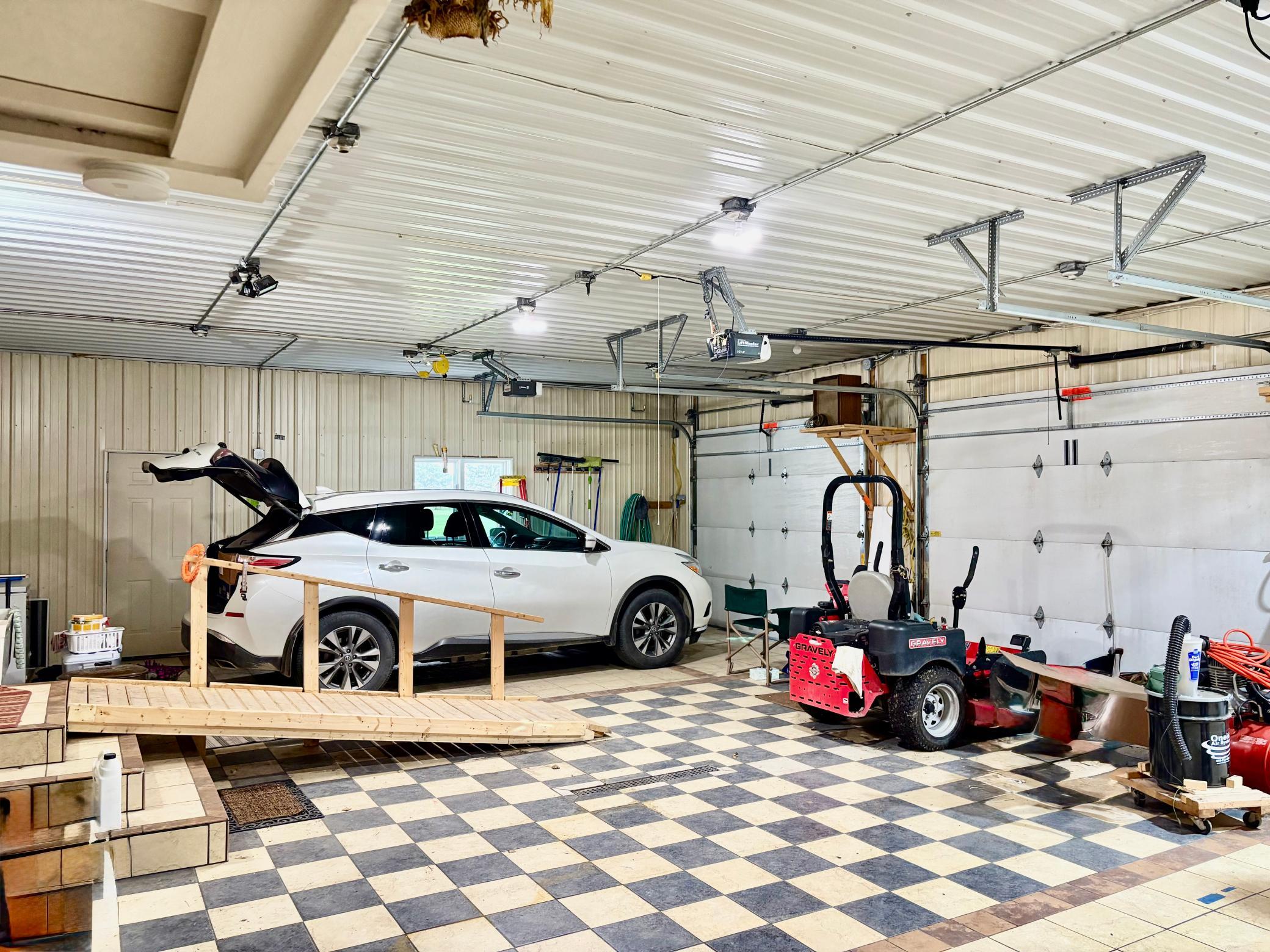 3 car attached garage with in floor heat
