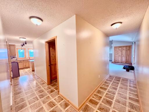 Laundry in middle, hallway to kitchen and to living room
