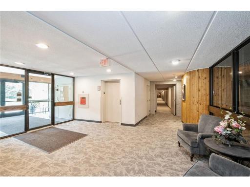 Secure doors lead to front lobby & immediate elevator access to 3rd floor
