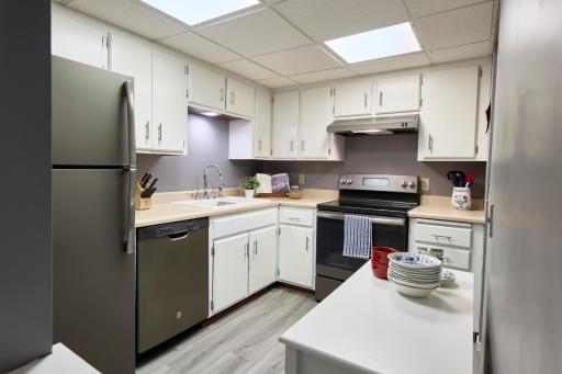 Bright Kitchen with Stainless Steel Appliances
