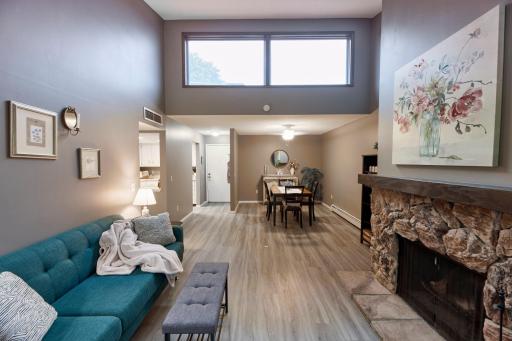 Clerestory windows add additional natural light to this vaulted ceiling main living space