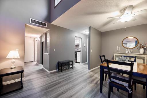 Living, Dining and Kitchen all connected with Hallway leading to Bath, Laundry and Bedroom