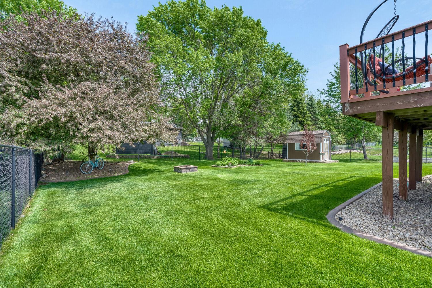 Beautiful fully fenced back yard with 8x10 shed