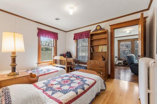 Just past one of the 4 upper bedrooms is a separate, private living area!