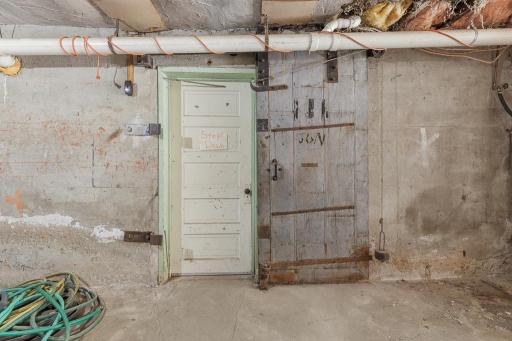 The original safety door between garage and basement.