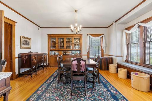 Stunning built-in buffet with leaded glass doors and beveled mirrors.