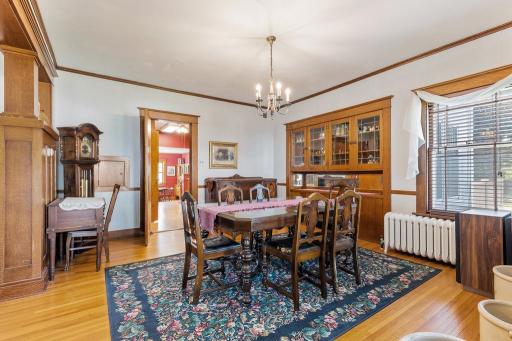 Dining room flows into kitchen via swing door.