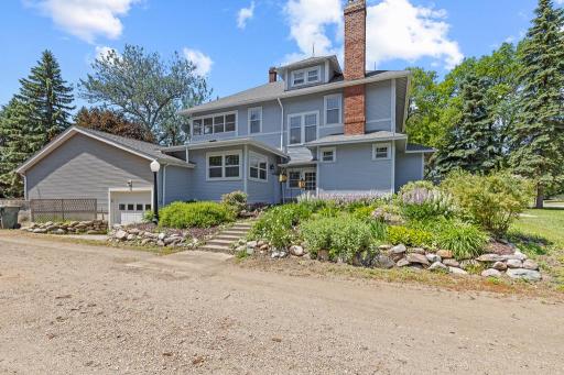 3 separate doorway entrances, as well as 2 separate attached garage entries to the home!