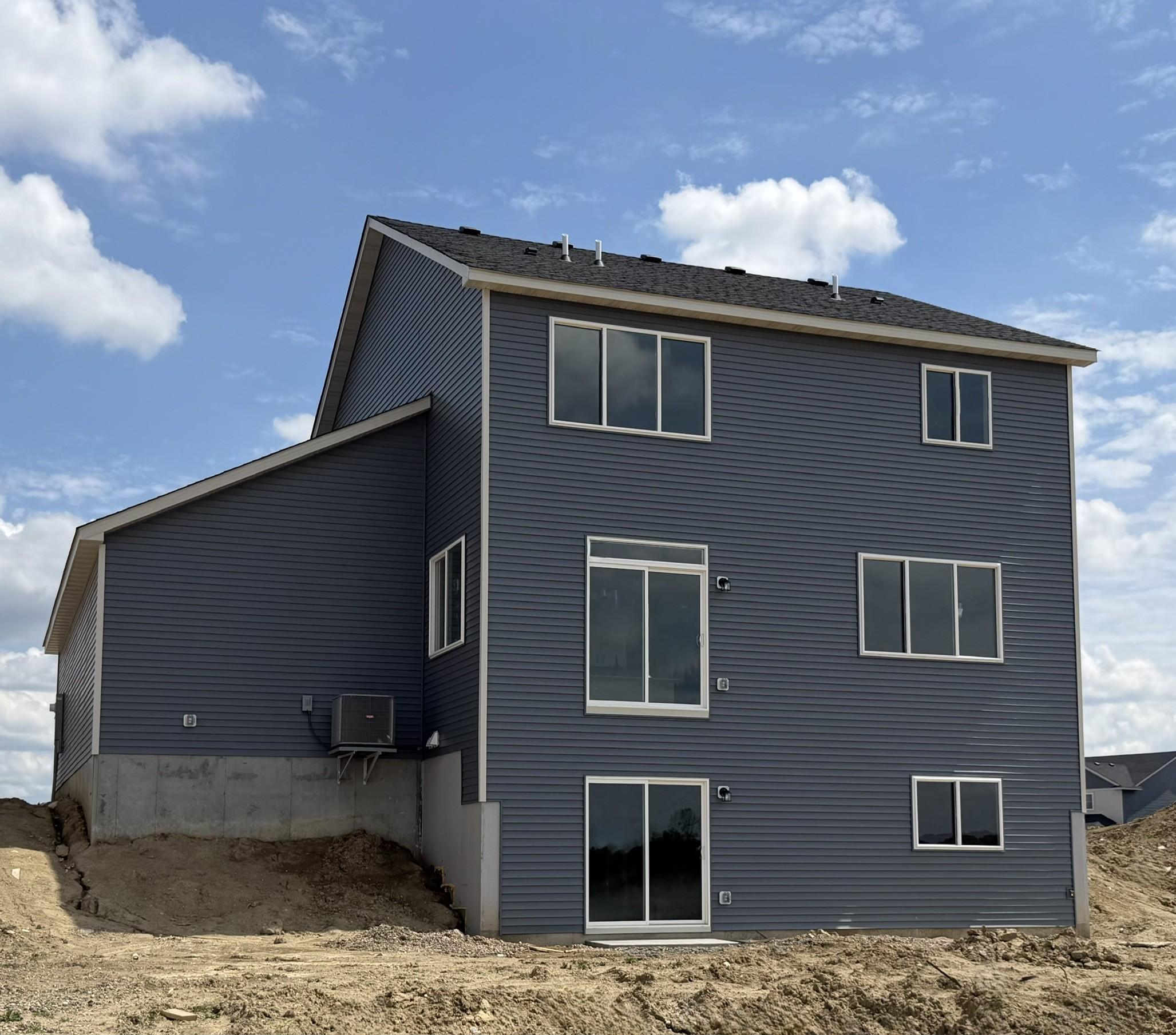 3153 Jandura Ave NE- Home features a Walkout Lower Level to a spacious backyard. Sod and Irrigation System included.