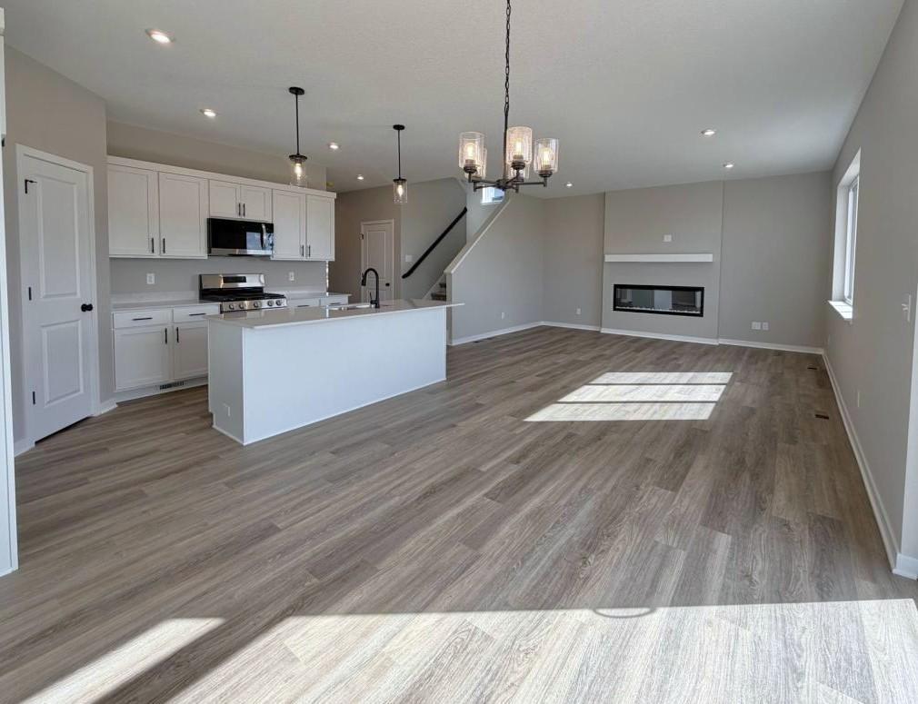 PHOTO OF A DIFFERENT HOME WITH SIMILAR PLAN. FINISHES MAY VARY.