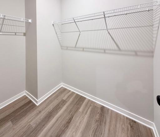 PHOTO OF A DIFFERENT HOME WITH SIMILAR PLAN. FINISHES MAY VARY. Mudroom Walk-in Closet.