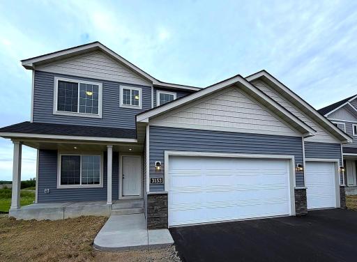 3153 Jandura Ave NE- Home is ready for a Quick Move-in! Highlights include a 4 BAY GARAGE on Walkout Homesite! Landscaping, irrigation, & sod will be installed & front door painted soon.