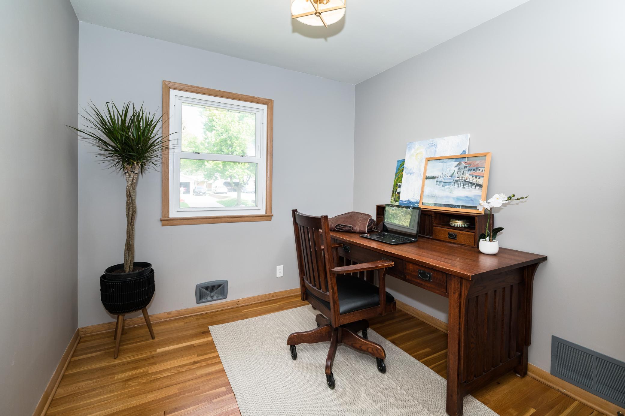 Main floor third bedroom currently used as a home office