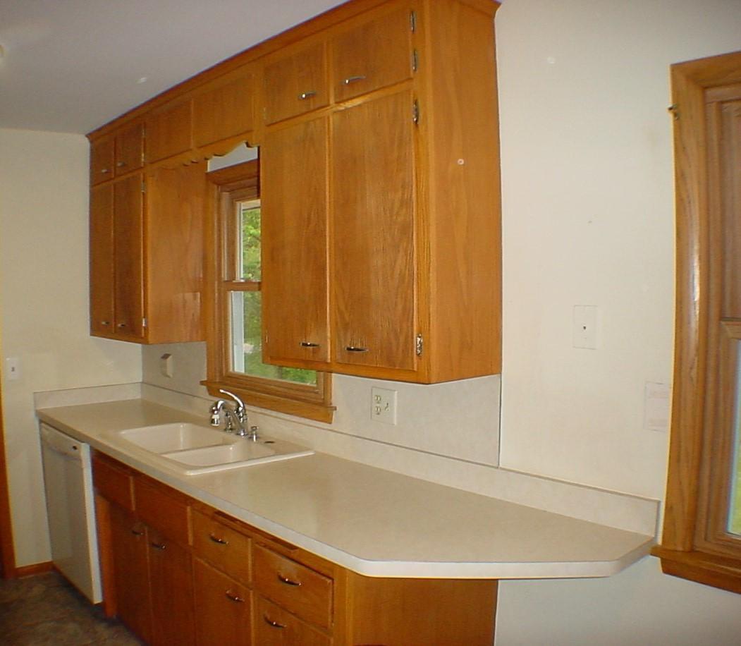 This kitchen has breathtaking views of morning deer walking through the park. Not a bad view in site!