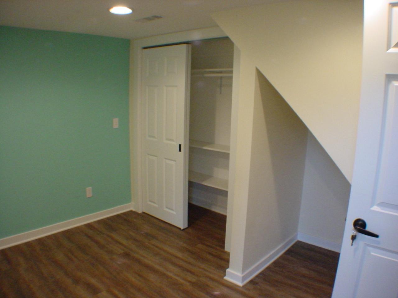 Bdrm 4 lower level full closet & understairs storage or nook.