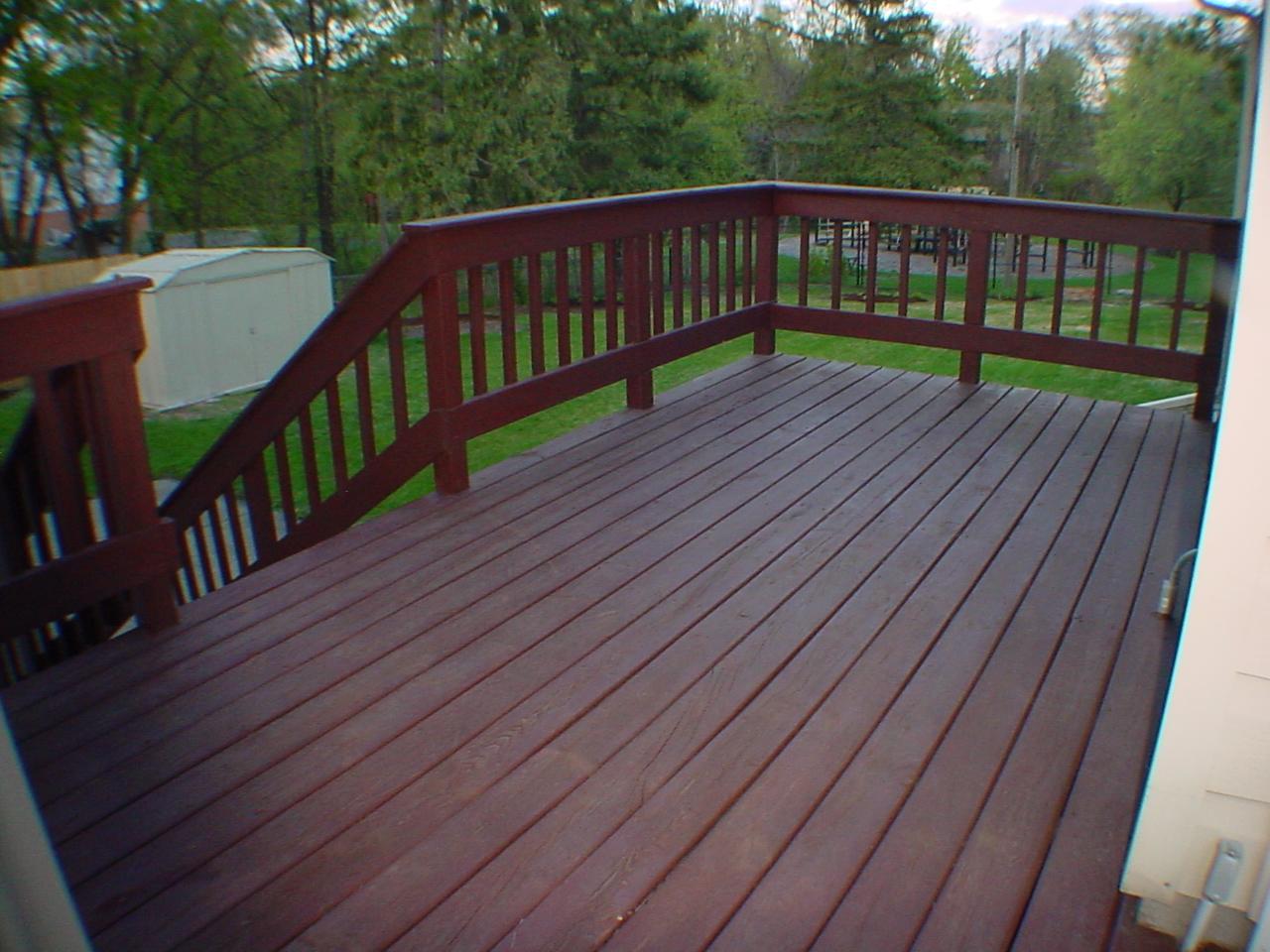 Main level 16 x 8 deck walks down to patio and lower level.
