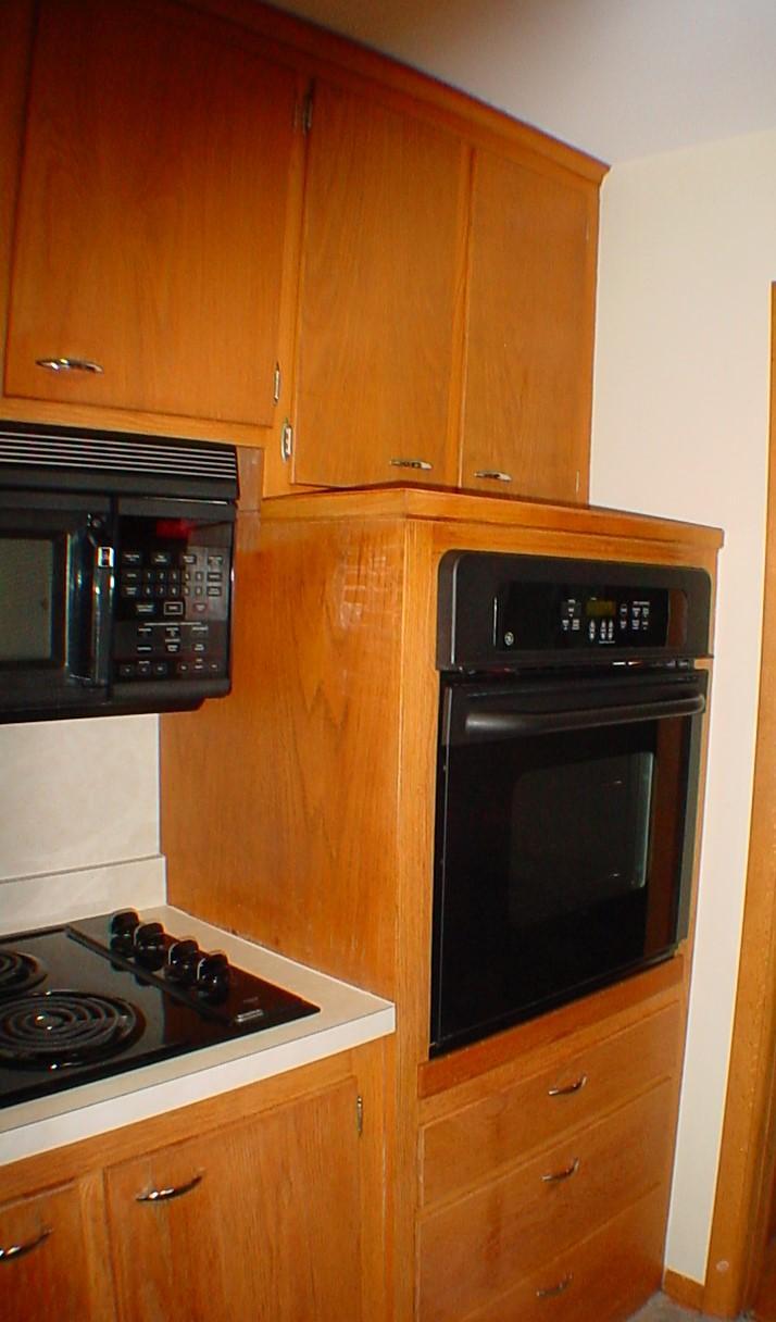 Wall oven, electric stove top and direct vent microwave.