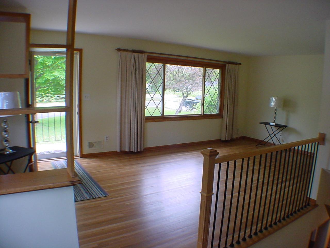 Beautifully renovated flooring and a custom open staircase welcomes you!