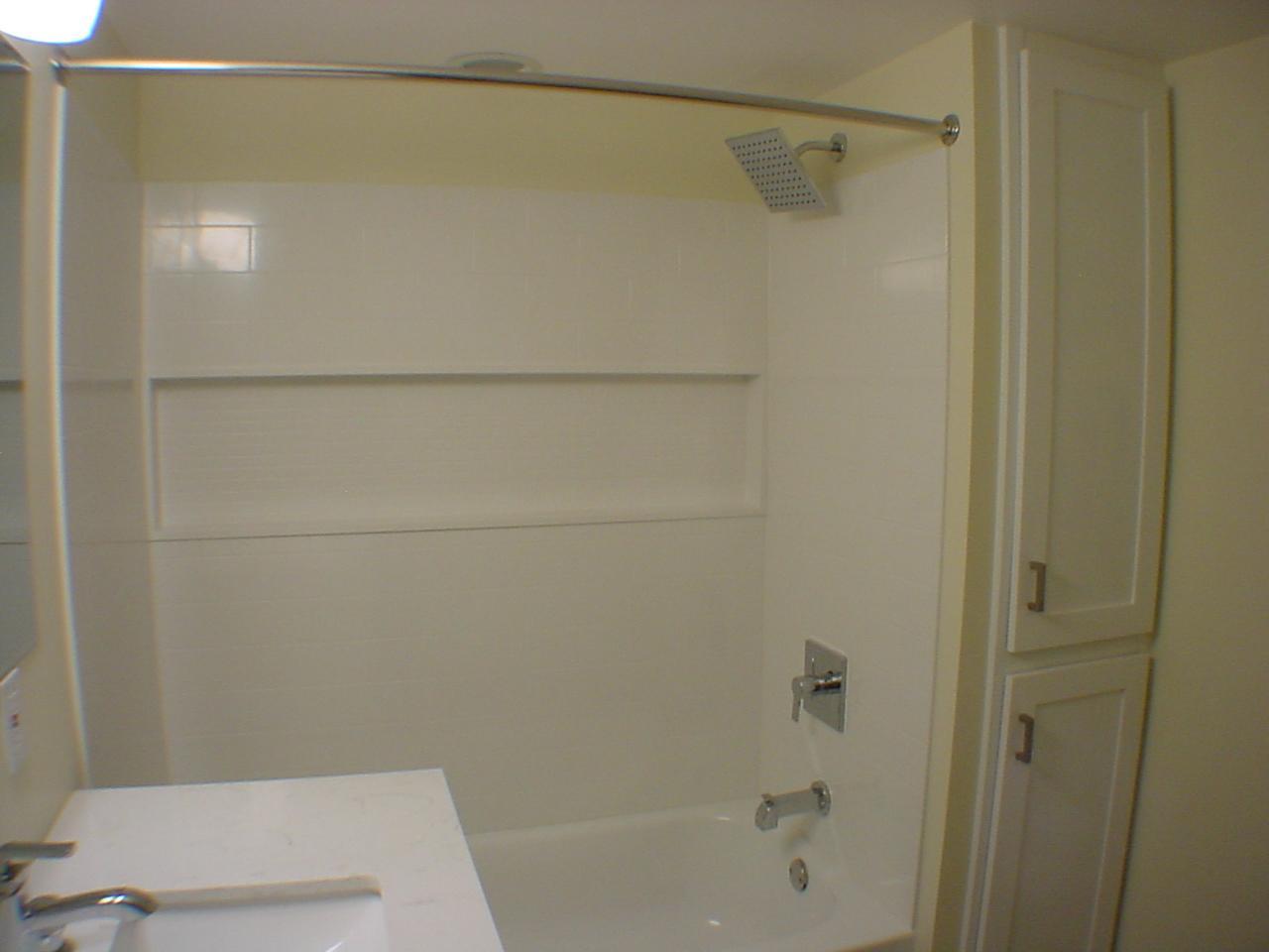 Full lower level bath with updated vanity and full linen closet. Great for company!