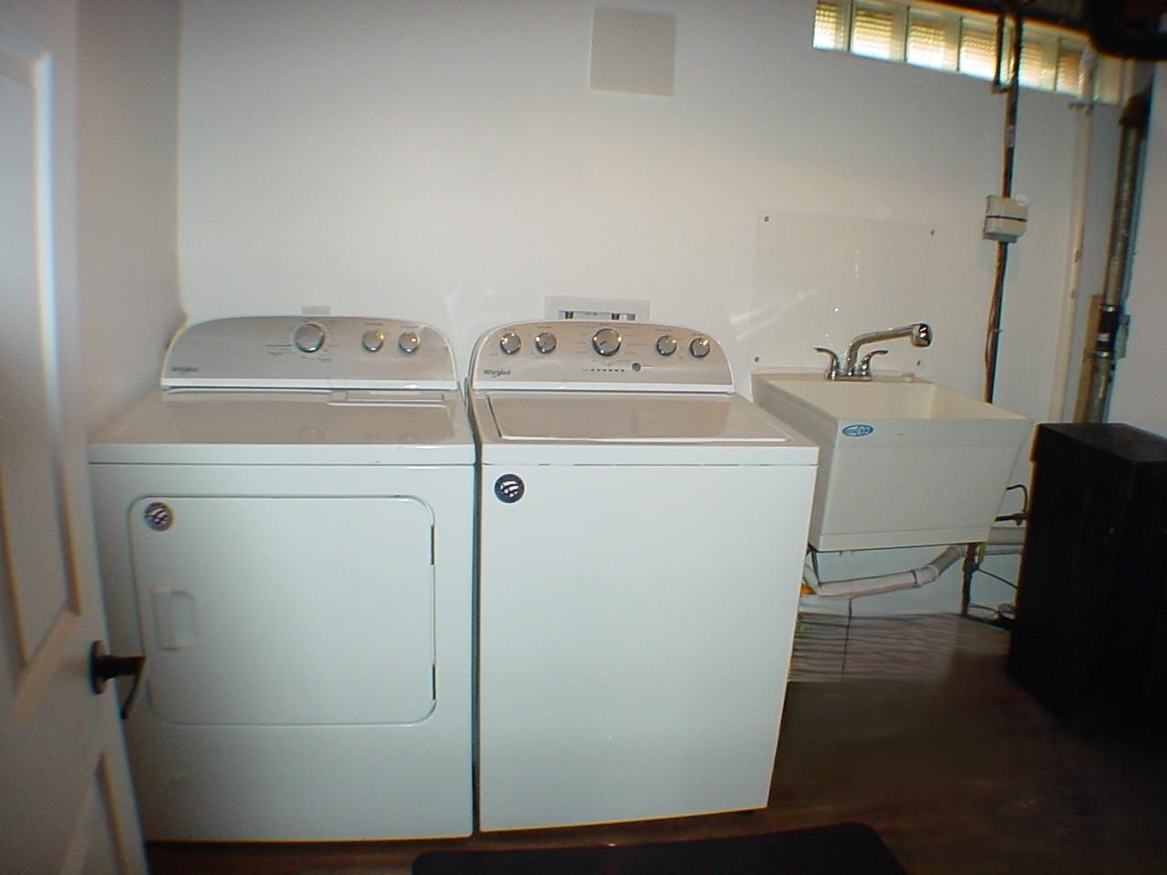 Newer Washer & Dryer included. Laundry utility room host laundry shoot and mechanicals. Just off family room hallway.