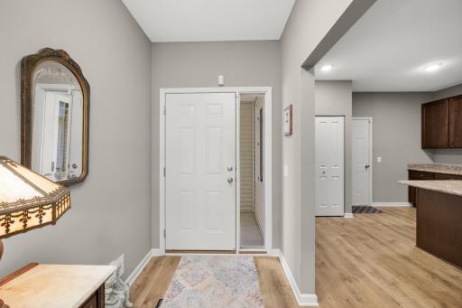 View of front door and foyer - kitchen to the right in photo