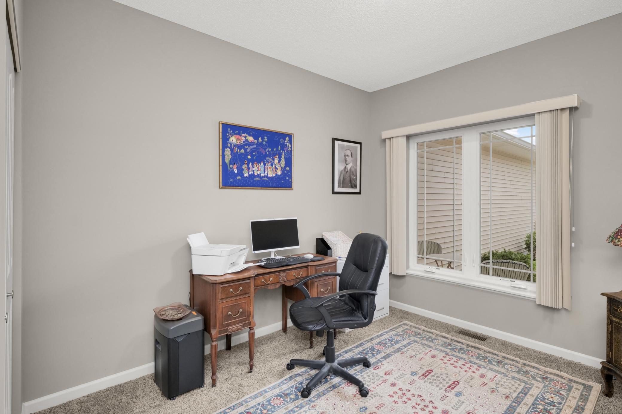 2nd bedroom (currently used as an office) with window to covered front patio
