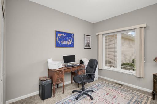 2nd bedroom (currently used as an office) with window to covered front patio