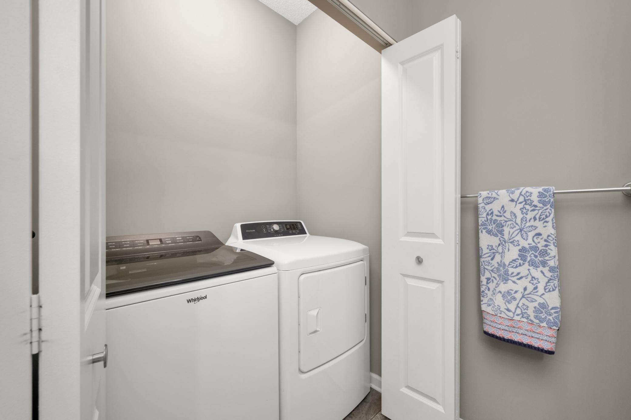 Full size washer and dryer in 3/4 hallway bath closet