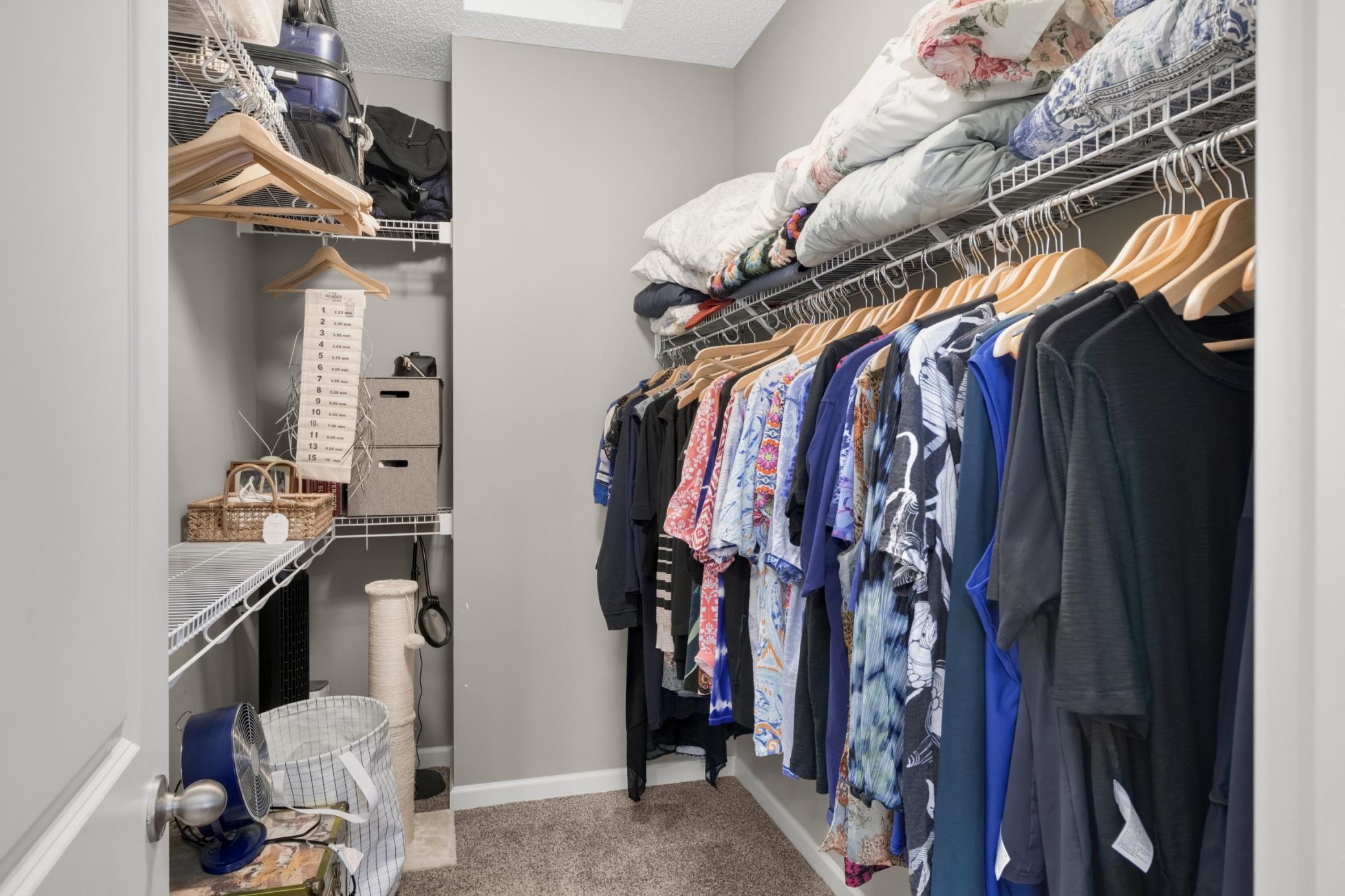 Large walk-in closet in master bedroom