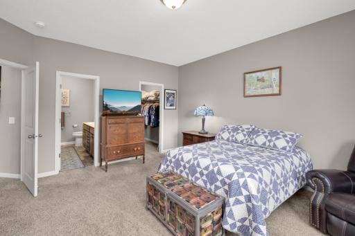 Master bedroom with ensuite full bath and walk-in closet